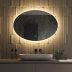 Luxe ovale badkamer spiegel, van alle gemakken voorzien, zoals: verlichting, spiegelverwarming, dim functie en instelbare lichtkleur